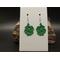Machine embroidered green four leaf clover earrings with raised edges. Silver hypoallergenic hooks.